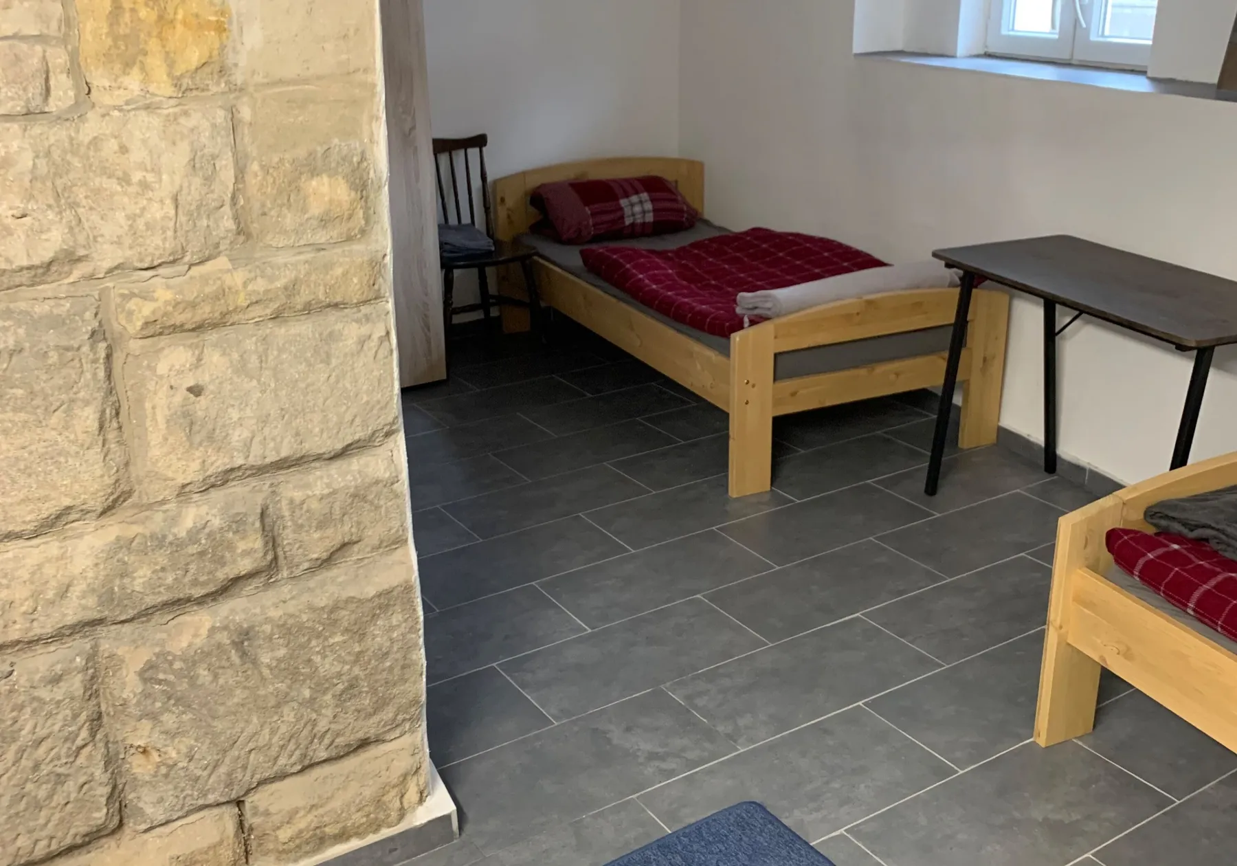 Mehrbettzimmer der Souterrainwohnung in Coburg